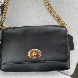 Coach black leather clutch